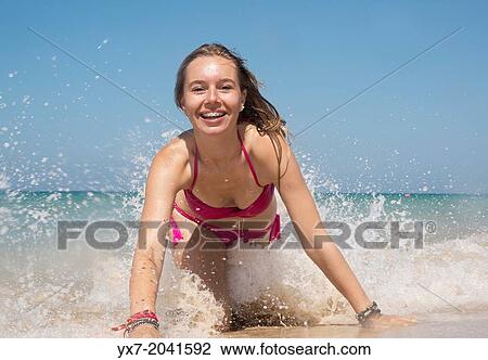 Young teenager at the beach. View Large Photo Image Stock Image - Young teenager at the beach.. Fotosearch