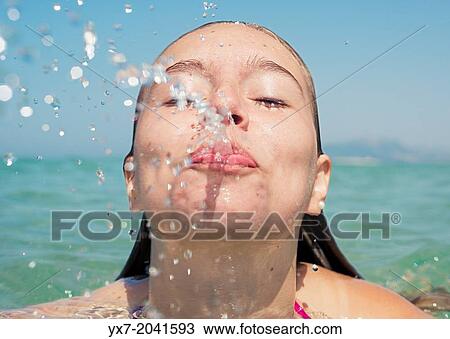 Young teenager at the beach. View Large Photo Image Stock Image - Young teenager at the beach.. Fotosearch