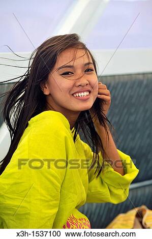 Stock Image - Young Thai woman Krabi, Thailand, Asia. Fotosearch