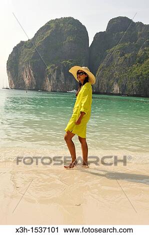 Young thai woman on the beach, Maya Bay, Koh Phi Phi Lee island Krabi, Thailand, Asia View Large Photo Image Stock Image - Young thai woman on the beach, Maya Bay, Koh Phi Phi Lee island Krabi, Thailand, Asia. Fotosearch