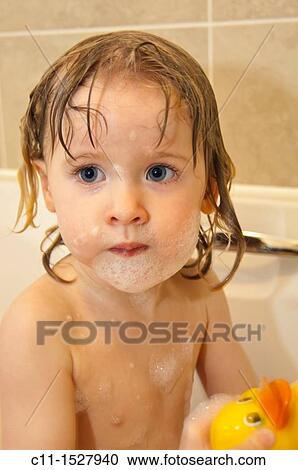 young three year old girl in bath having fun with bubbles View Large Photo Image Stock Image - young three year old girl in bath having fun with bubbles. Fotosearch