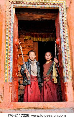 Young Tibetan monks in Kagbeni village in the Kingdom of Mustang in the Annapurna region of Nepal. View Large Photo Image Stock Photograph - Young Tibetan monks in Kagbeni village in the Kingdom of Mustang in the Annapurna region of Nepal.. Fotosearch