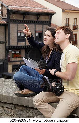 Young tourist couple. El Portal? n, Medieval town, Vitoria, Gasteiz, Alava, Basque Country, Spain View Large Photo Image Stock Image - Young tourist couple. El Portal? n, Medieval town, Vitoria, Gasteiz, Alava, Basque Country, Spain. Fotosearch