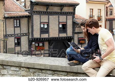Young tourist couple. El Portal? n, Medieval town, Vitoria, Gasteiz, Alava, Basque Country, Spain View Large Photo Image Stock Photo - Young tourist couple. El Portal? n, Medieval town, Vitoria, Gasteiz, Alava, Basque Country, Spain. Fotosearch