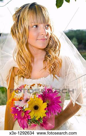 Picture - Young wedding bride smiling. Fotosearch