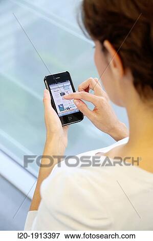 Young with smartphone View Large Photo Image Stock Photo - Young with smartphone. Fotosearch