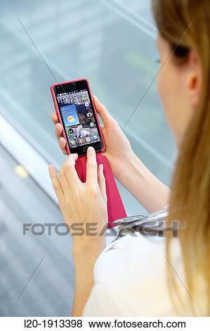 Young with smartphone View Large Photo Image Stock Photo - Young with smartphone. Fotosearch