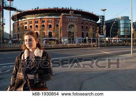 young woman, 21, in front of the Arenas de Barcelona, Barcelona, Spain View Large Photo Image Picture - young woman, 21, in front of the Arenas de Barcelona, Barcelona, Spain. Fotosearch