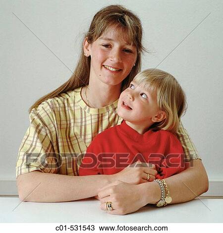 Stock Image - Young woman and little girl. Fotosearch