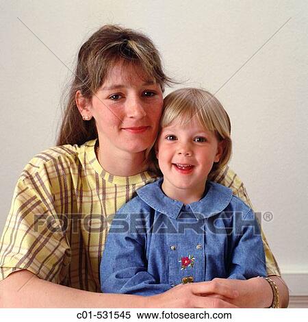Stock Photography - Young woman and little girl. Fotosearch