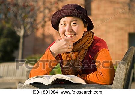 Young woman Asian student on Campus View Large Photo Image Picture - Young woman Asian student on Campus. Fotosearch