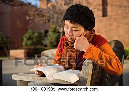Stock Photography - Young woman Asian Student on campus. Fotosearch