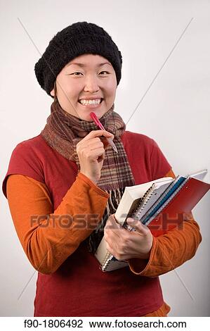 Stock Image - Young Woman Asian student. Fotosearch