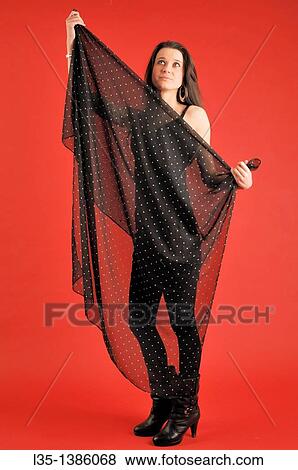 Young woman behind a transparent cloth View Large Photo Image Stock Photo - Young woman behind a transparent cloth. Fotosearch