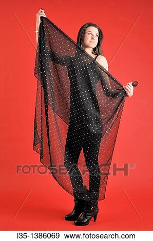 Young woman behind a transparent cloth View Large Photo Image Stock Photo - Young woman behind a transparent cloth. Fotosearch