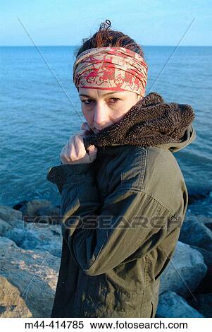 Young woman by the sea View Large Photo Image Stock Photography - Young woman by the sea. Fotosearch