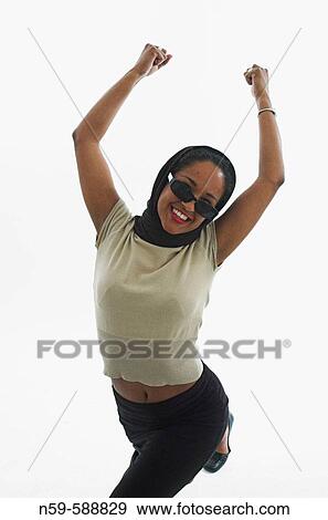 Young woman celebrating success. View Large Photo Image Stock Photo - Young woman celebrating success.. Fotosearch