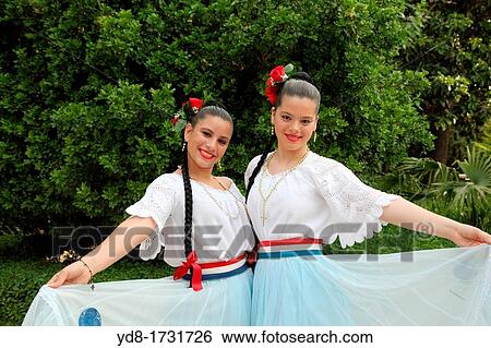 Young woman celebrating the week of cultures with their traditional dress malaga, Malaga province, Andalusia, Spain. View Large Photo Image Stock Photograph - Young woman celebrating the week of cultures with their traditional dress malaga, Malaga province, Andalusia, Spain.. Fotosearch
