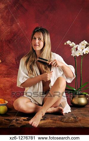 young woman combing View Large Photo Image Stock Image - young woman combing. Fotosearch