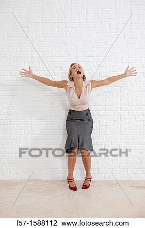 Young woman conveying desperation View Large Photo Image Stock Image - Young woman conveying desperation. Fotosearch