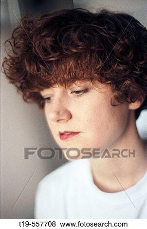 Young woman deep in thought View Large Photo Image Stock Photo - Young woman deep in thought. Fotosearch