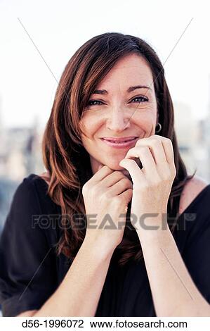 young woman dressed in black View Large Photo Image Stock Image - young woman dressed in black. Fotosearch