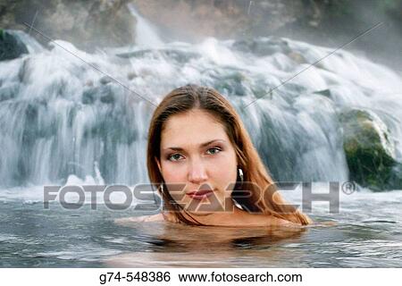 Young woman enjoying hot springs View Large Photo Image Stock Photograph - Young woman enjoying hot springs. Fotosearch