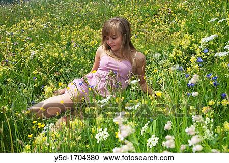 Young woman enjoying warm spring in Swiss Alps, Saas Fee, Valais canton