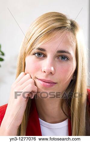 Young woman face closeup View Large Photo Image Stock Photograph - Young woman face closeup. Fotosearch