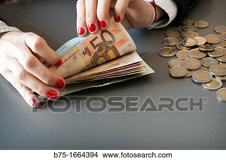 young woman hands counting euros View Large Photo Image Picture - young woman hands counting euros. Fotosearch