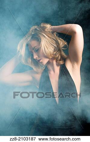 Young woman head in hands. View Large Photo Image Stock Photo - Young woman head in hands.. Fotosearch