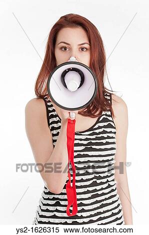 Young woman holding a megaphone View Large Photo Image Stock Photography - Young woman holding a megaphone. Fotosearch
