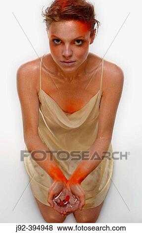 Stock Photo - Young Woman Holding Gold Fish.. Fotosearch
