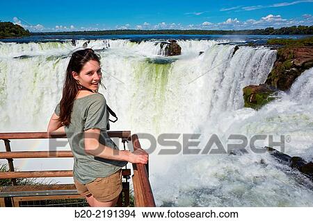 Picture - Young woman. Iguaz Falls. Iguaz National Park. Argentina/Brazil. Fotosearch
