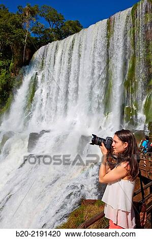 Stock Image - Young woman. Iguaz Falls. Iguaz National Park. Argentina/Brazil. Fotosearch