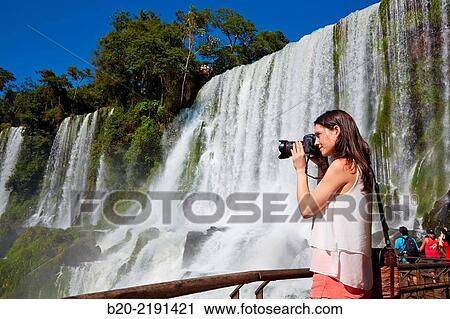 Stock Image - Young woman. Iguaz Falls. Iguaz National Park. Argentina/Brazil. Fotosearch