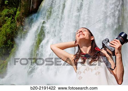 Young woman. Iguaz Falls. Iguaz National Park. Argentina/Brazil View Large Photo Image Stock Image - Young woman. Iguaz Falls. Iguaz National Park. Argentina/Brazil. Fotosearch