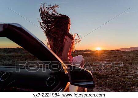 Young woman in a convertible car. Tarifa, Cadiz, Andalusia, Spain, Europe. View Large Photo Image Picture - Young woman in a convertible car. Tarifa, Cadiz, Andalusia, Spain, Europe.. Fotosearch