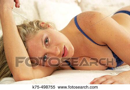 Young woman in bed View Large Photo Image Stock Photography - Young woman in bed. Fotosearch