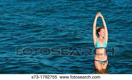 Young woman in bikini in Mediterranean sea, MBlaga, Andaluc? a, Spain View Large Photo Image Stock Photography - Young woman in bikini in Mediterranean sea, MBlaga, Andaluc? a, Spain. Fotosearch