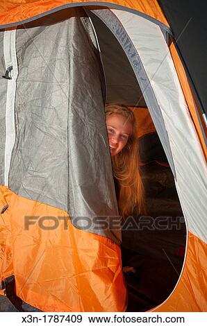Young woman in camping tent View Large Photo Image Stock Photo - Young woman in camping tent. Fotosearch