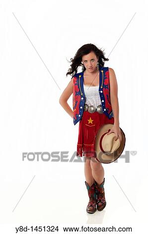 Picture - Young woman in cowgirl outfit. Fotosearch