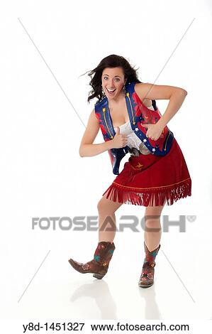 Stock Photo - Young woman in cowgirl outfit. Fotosearch