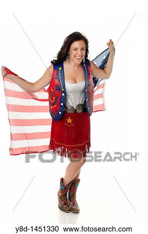 Young woman in cowgirl outfit waving American flag View Large Photo Image Stock Image - Young woman in cowgirl outfit waving American flag. Fotosearch
