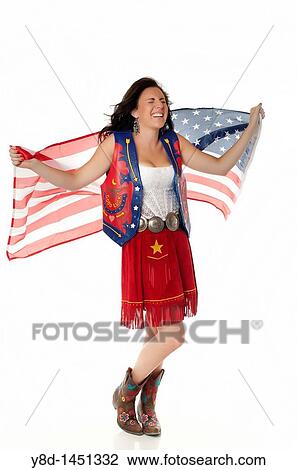 Young woman in cowgirl outfit waving american flag View Large Photo Image Stock Image - Young woman in cowgirl outfit waving american flag. Fotosearch