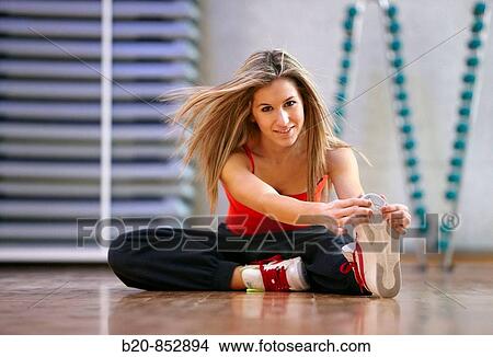 Young woman in gym, dance exercise, aerobics, fitness View Large Photo Image Picture - Young woman in gym, dance exercise, aerobics, fitness. Fotosearch