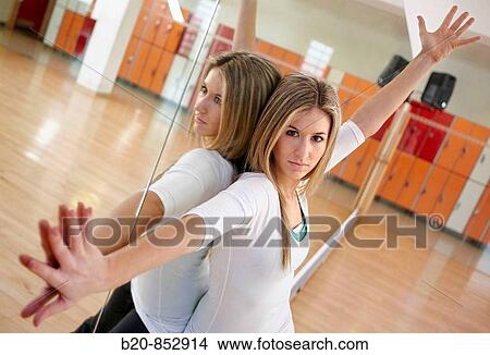Young woman in gym, dance exercise, aerobics, fitness View Large Photo Image Picture - Young woman in gym, dance exercise, aerobics, fitness. Fotosearch
