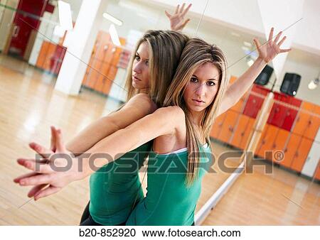 Young woman in gym, dance exercise, aerobics, fitness View Large Photo Image Stock Image - Young woman in gym, dance exercise, aerobics, fitness. Fotosearch