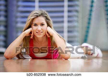 Young woman in gym View Large Photo Image Stock Photo - Young woman in gym. Fotosearch