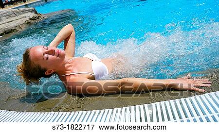 Young woman in jacuzzi View Large Photo Image Stock Photo - Young woman in jacuzzi. Fotosearch